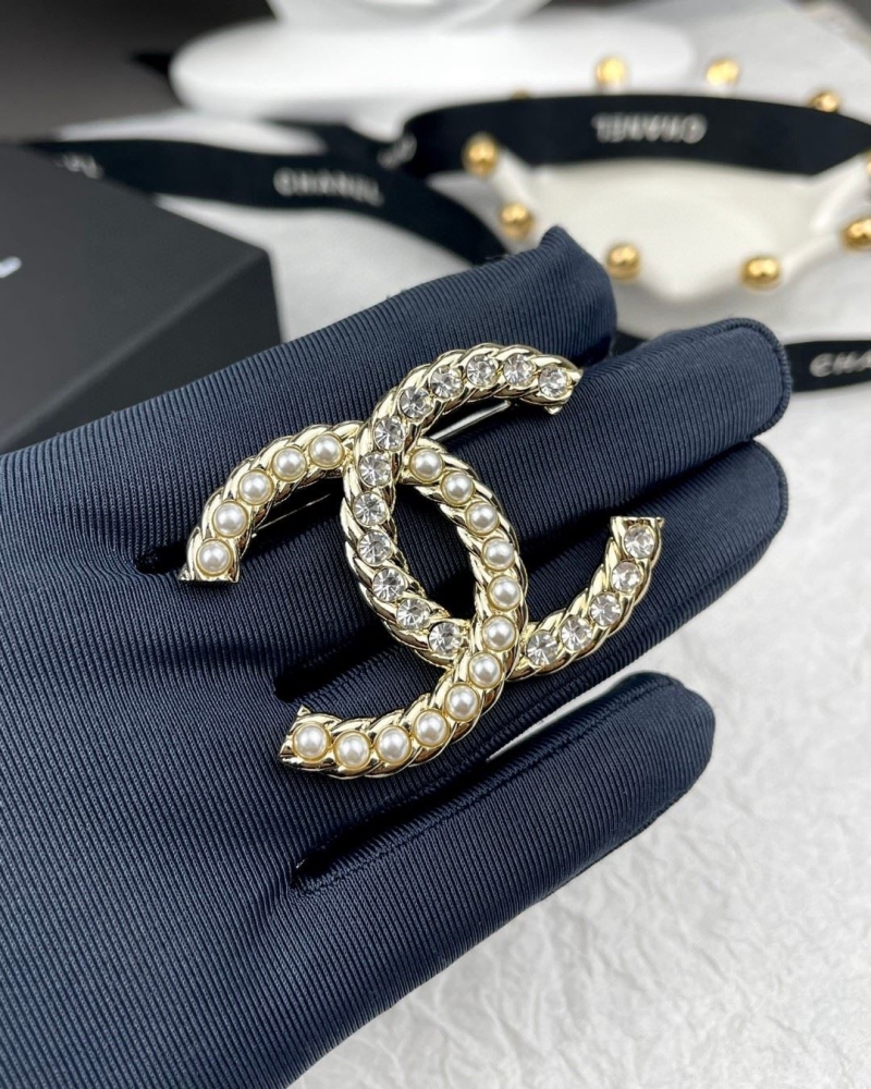 Ch**el brooches